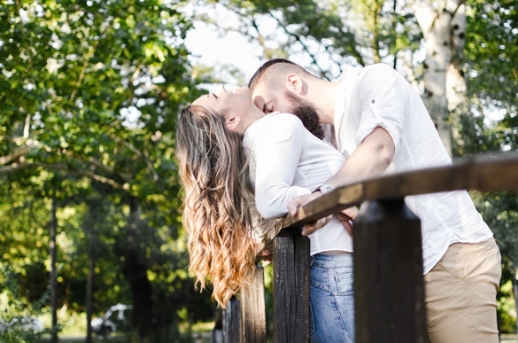 sexy macho man kissing woman breasts in nature - Are Gemini Men Perverts